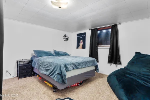 a kitchen with a sink and a refrigerator