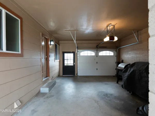 a patio with table and chairs