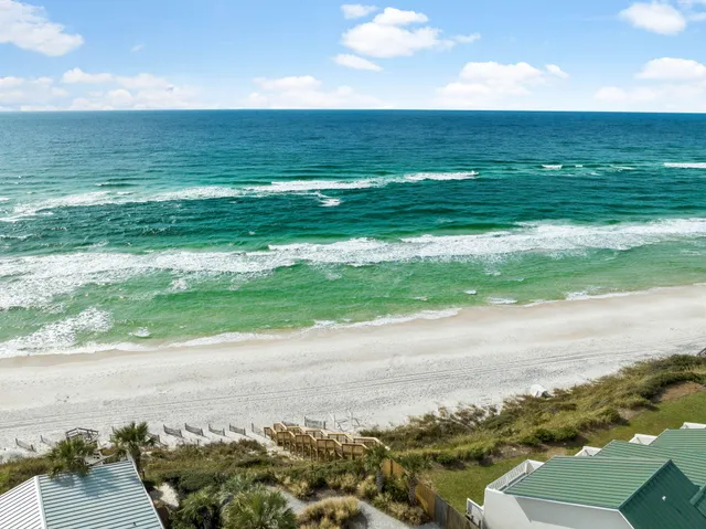 a view of a lake with a big yard