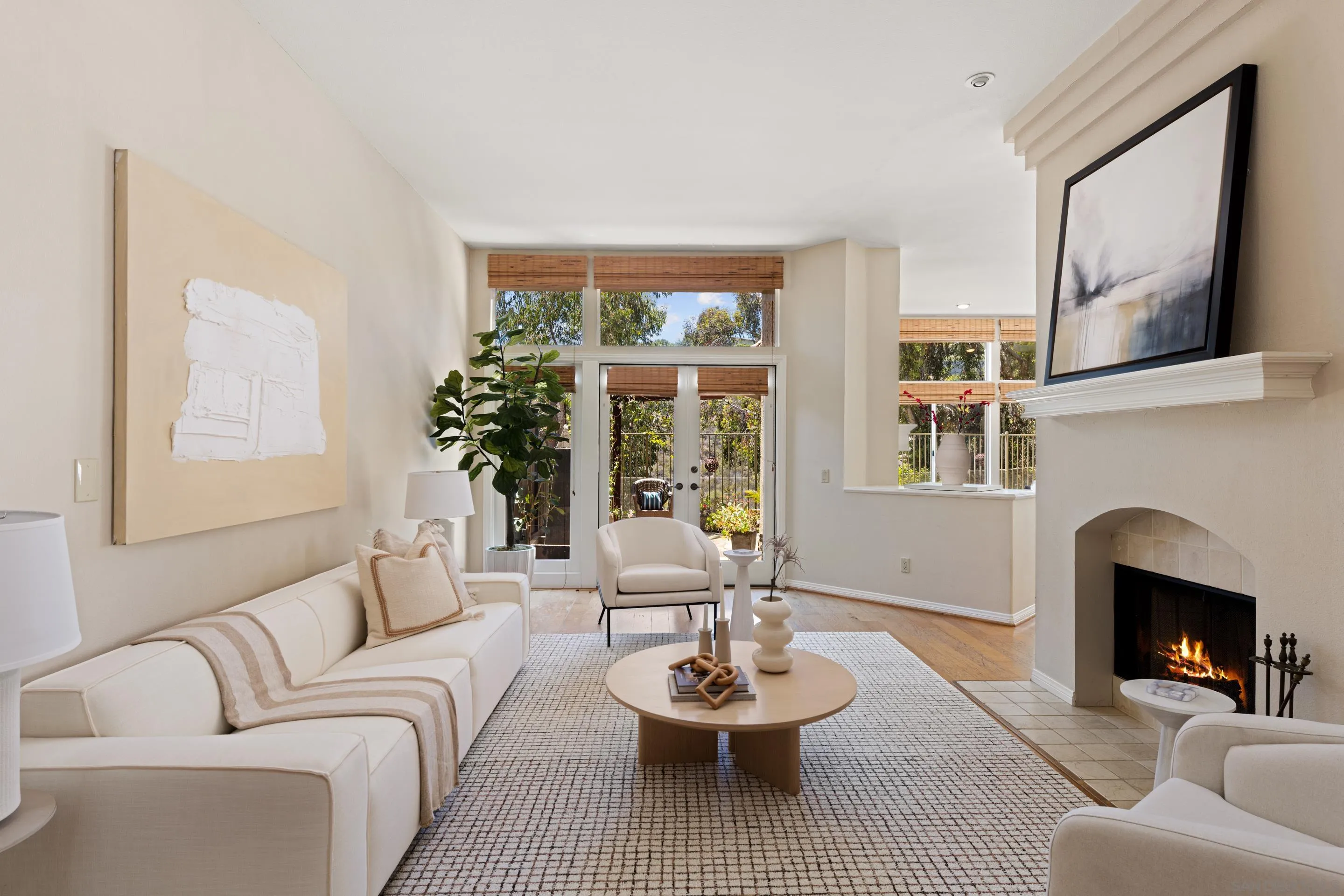 1466 Caminito Solidago La Jolla, CA 92037 - Photo 1 of 62 a living room with furniture and a fireplace