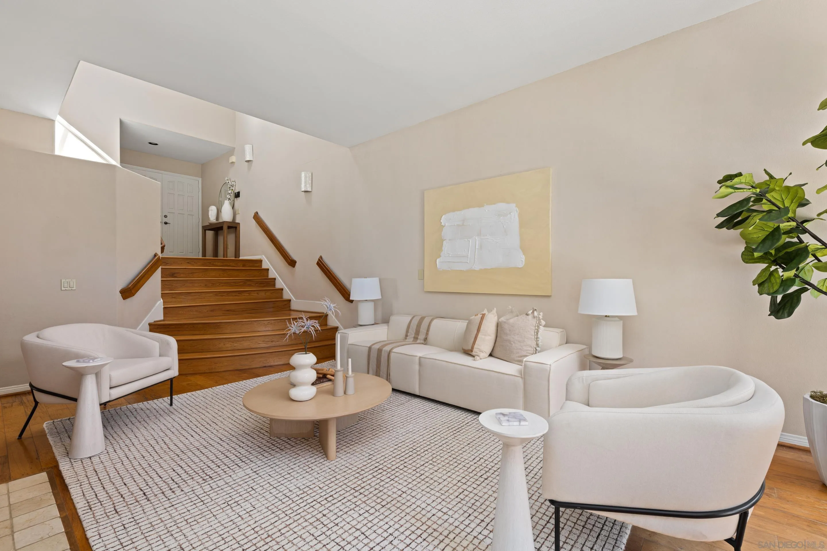 1466 Caminito Solidago La Jolla, CA 92037 - Photo 18 of 62 a living room with furniture and a potted plant