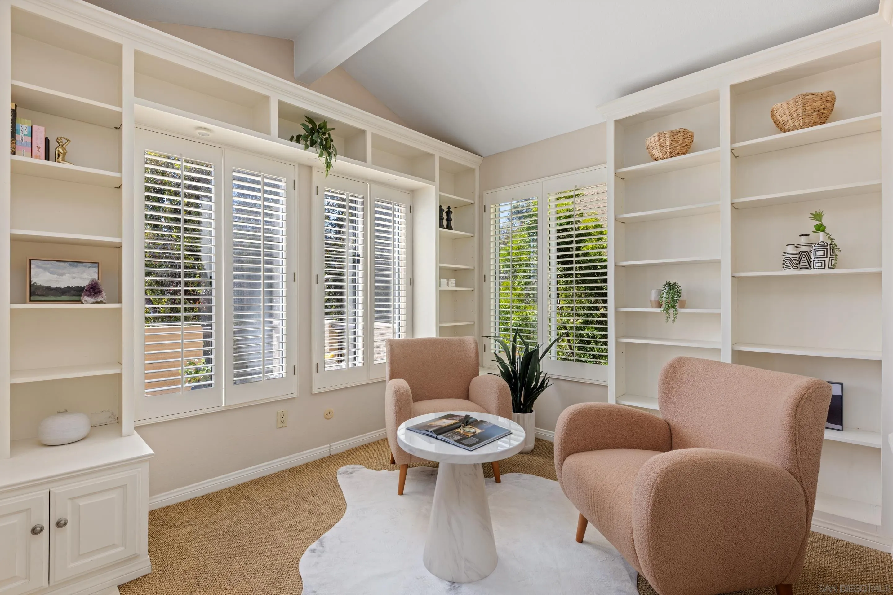 1466 Caminito Solidago La Jolla, CA 92037 - Photo 24 of 62 a living room with furniture and a large window