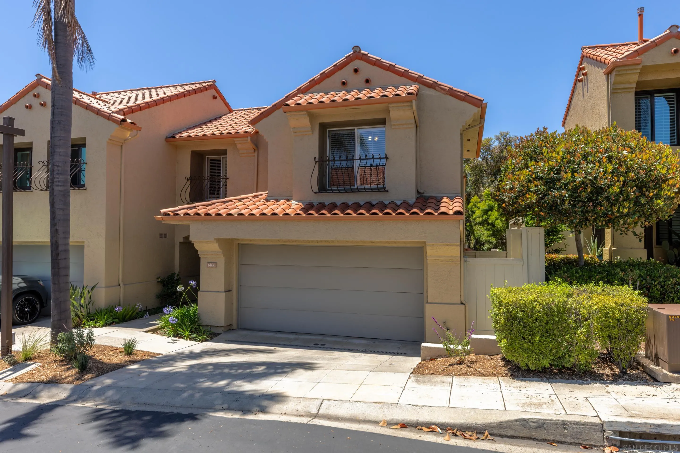 1466 Caminito Solidago La Jolla, CA 92037 - Photo 31 of 62 a front view of a house with garden