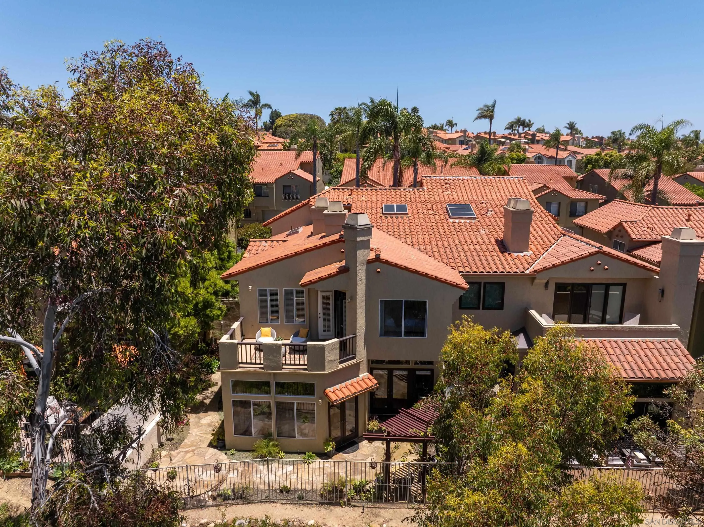 1466 Caminito Solidago La Jolla, CA 92037 - Photo 45 of 62 a front view of a house with a yard