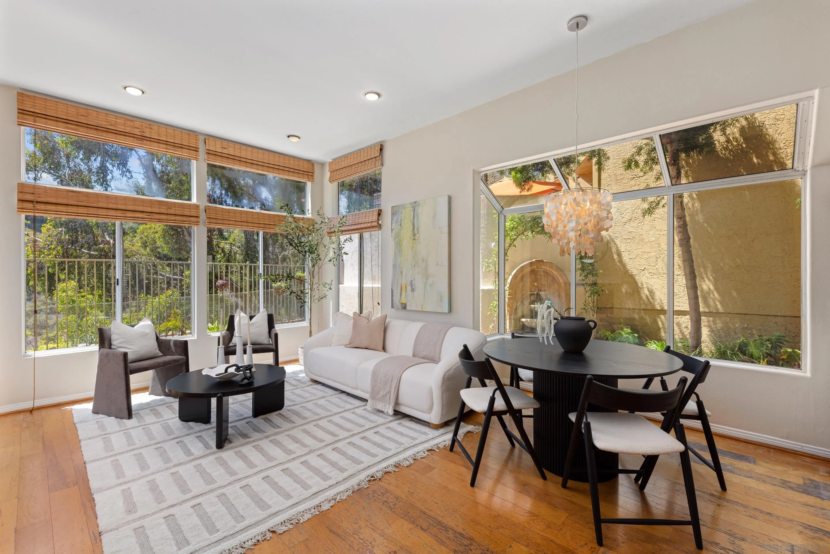 1466 Caminito Solidago La Jolla, CA 92037 - Photo 6 of 62 a living room with furniture and a large window