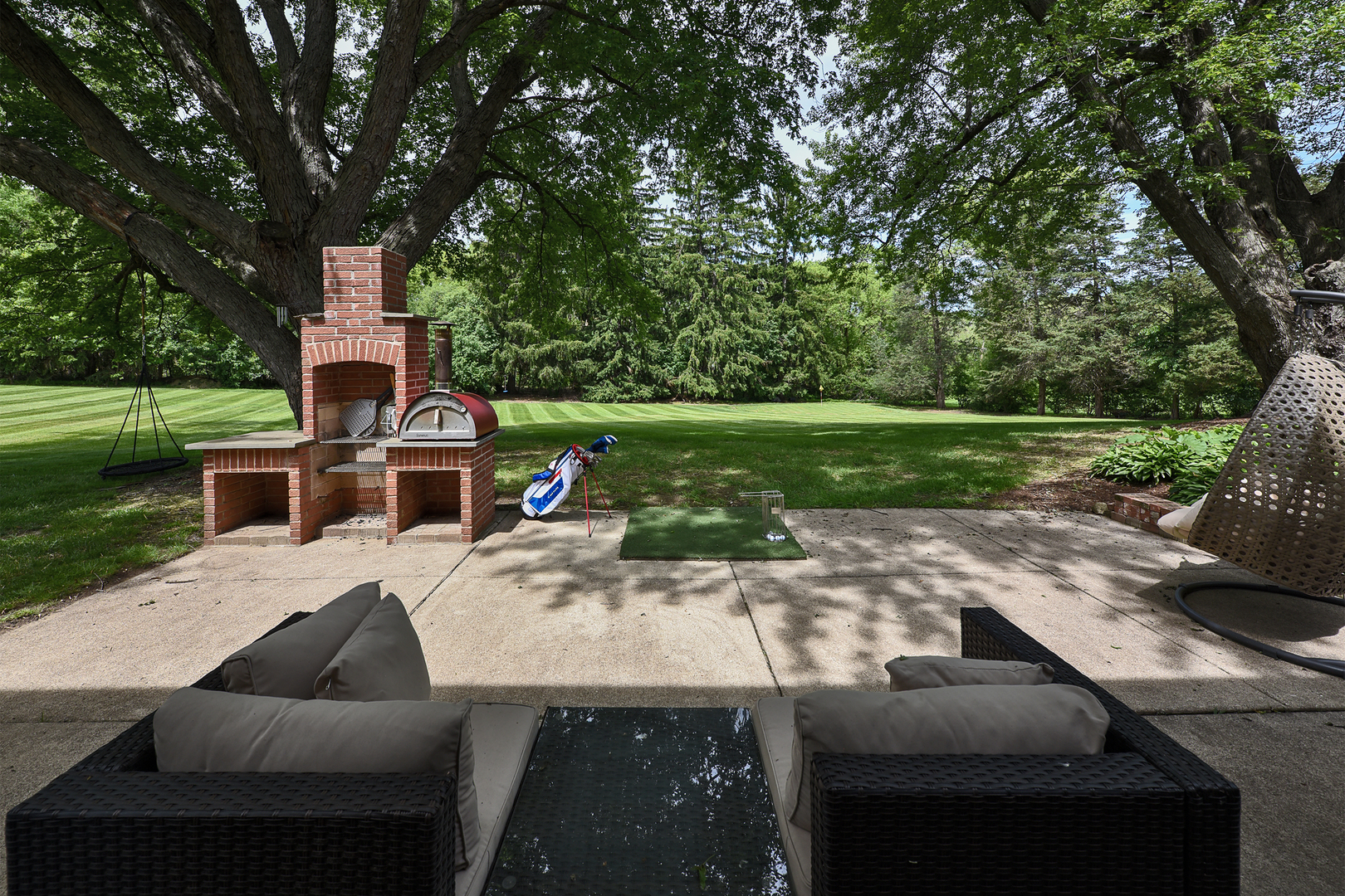 144 North Highland Road Inverness, IL 60067 - Photo 40 of 49 a view of house with backyard outdoor seating and green space