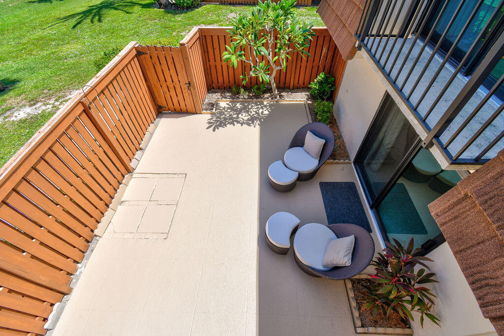 3900 County Line Road, Unit 22A Tequesta, FL 33469 - Photo 40 of 51 a view of balcony with furniture