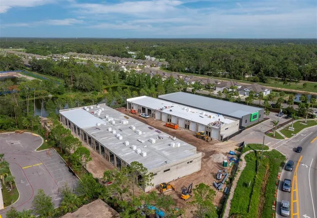an aerial view of a house with a garden