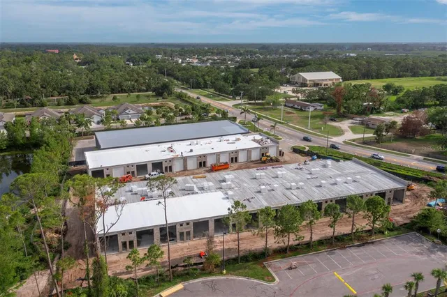 an aerial view of a house with a garden
