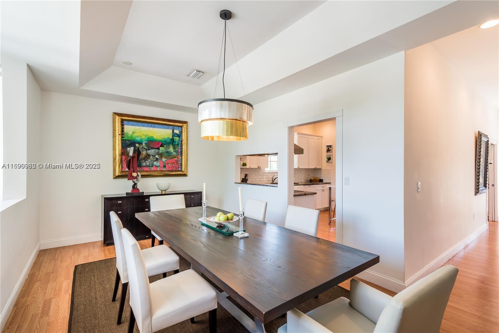 325 Pacific Road Key Biscayne, FL 33149 - Photo 9 of 31 a view of a dining room with furniture