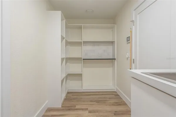 a view of an empty walk in closet