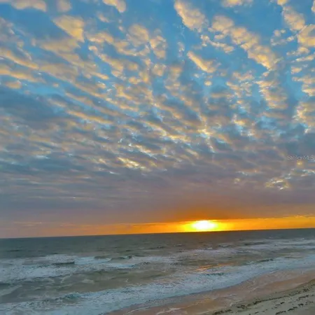 a view of a room with an ocean