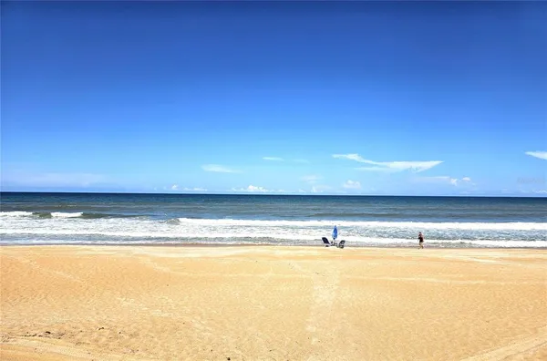 a view of swimming pool from a balcony