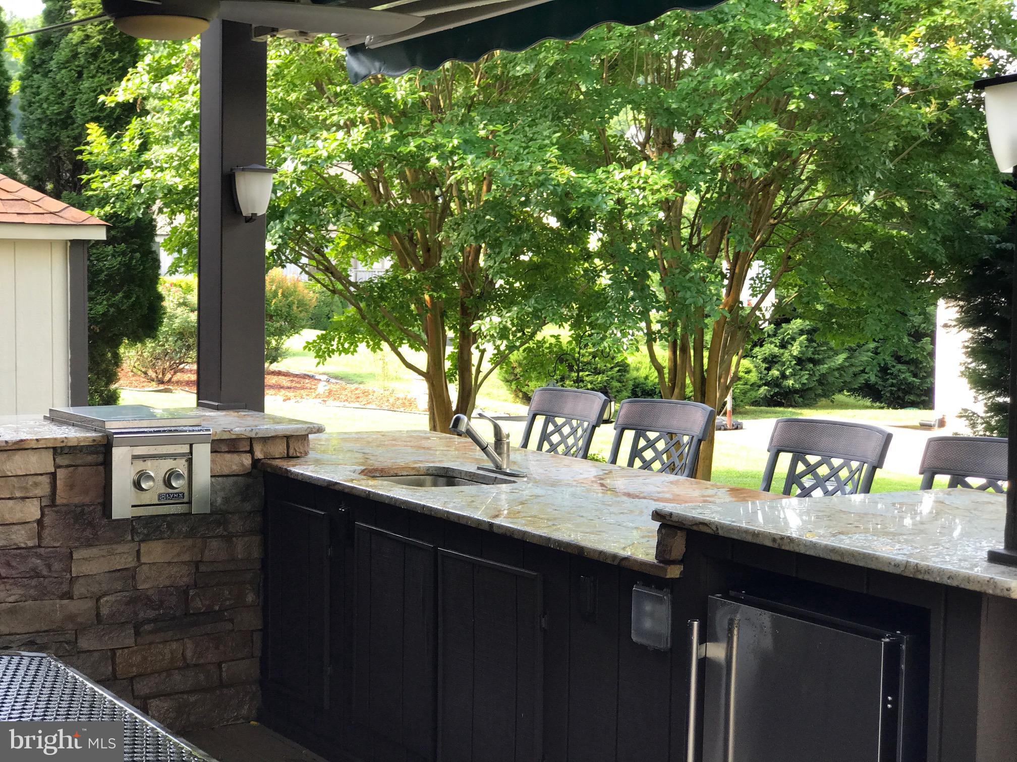 6008 Marineview Road King George, VA 22485 - Photo 6 of 30 Outside Kitchen Granite/Refrigerator/ BBQ/Views
