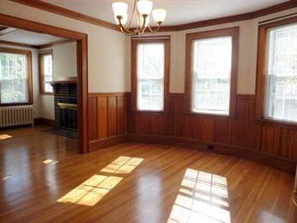 a view of livingroom with hardwood floor and a ceiling fan