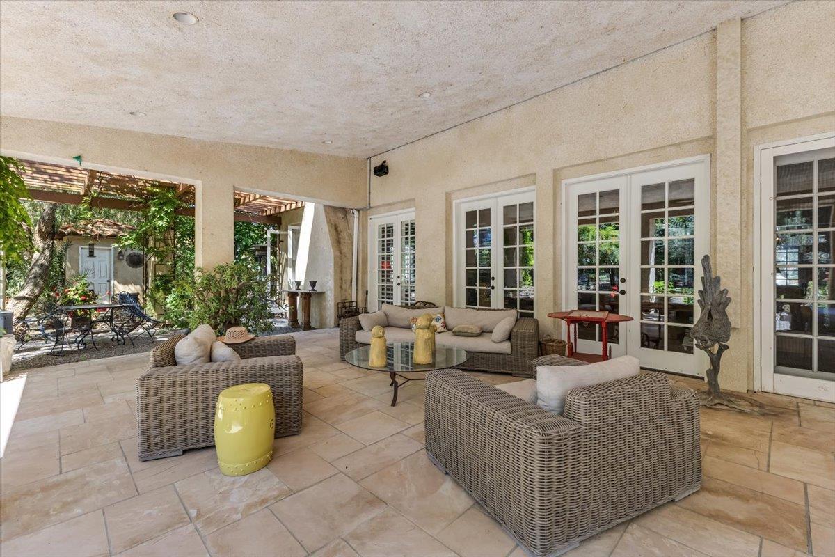2727 Thomas Road Hollister, CA 95023 - Photo 40 of 83 a living room with furniture and floor to ceiling windows