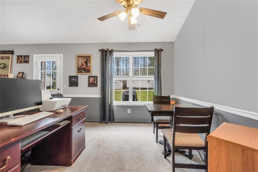 15 Tara Way Covington, GA 30016 - Photo 13 of 40 a room with furniture and window