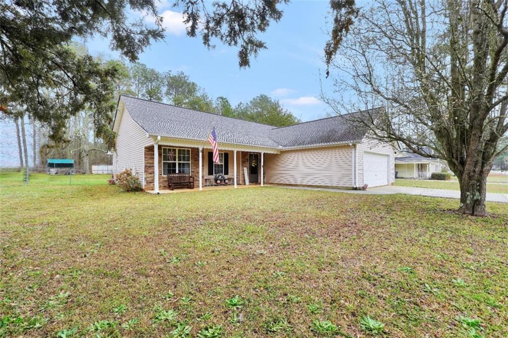 15 Tara Way Covington, GA 30016 - Photo 3 of 40 a view of a house with a yard