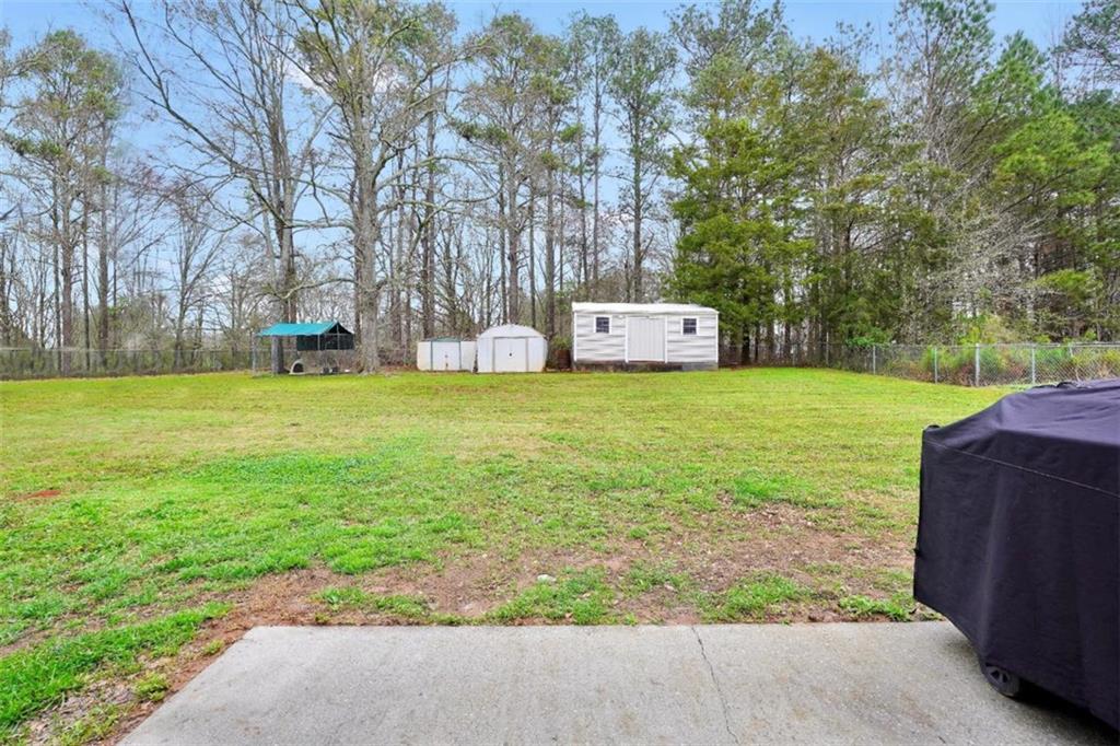 15 Tara Way Covington, GA 30016 - Photo 33 of 40 a view of a field with large trees