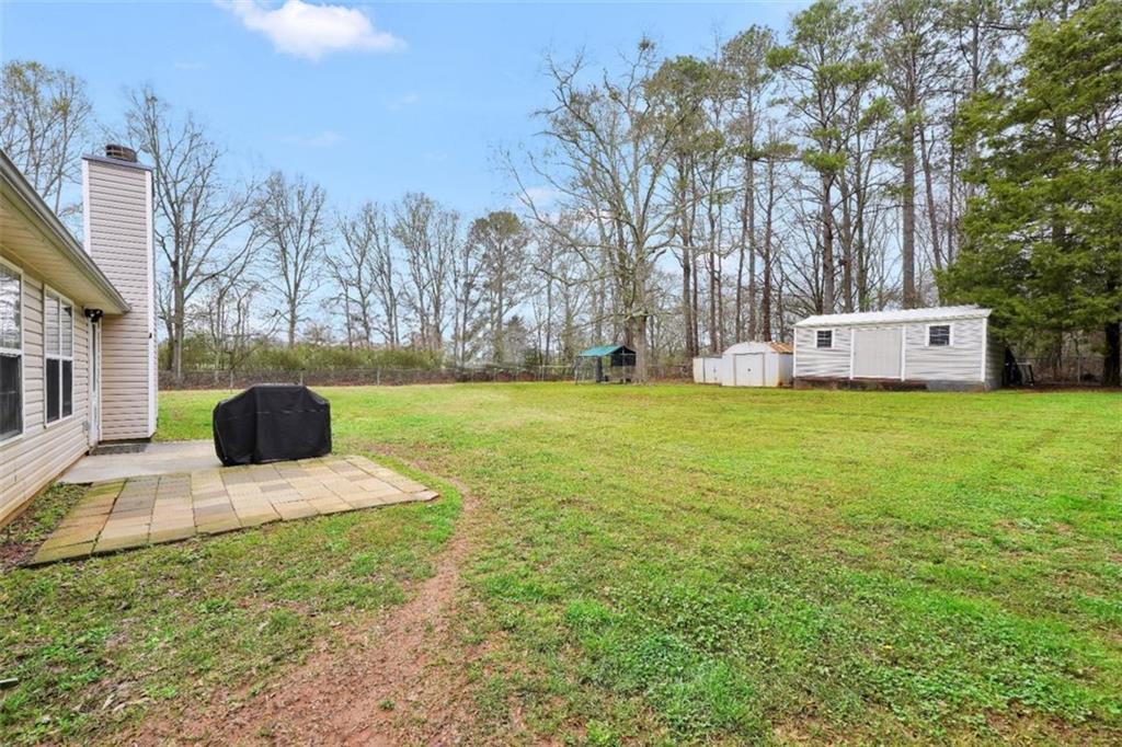 15 Tara Way Covington, GA 30016 - Photo 34 of 40 a view of a garden with trees