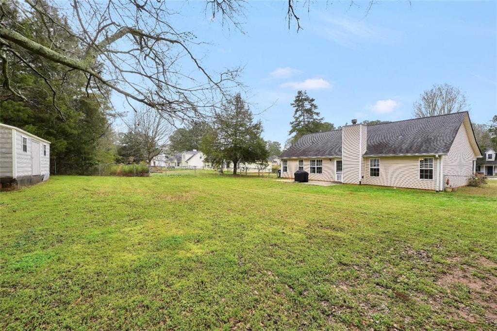 15 Tara Way Covington, GA 30016 - Photo 36 of 40 a view of a house with a big yard