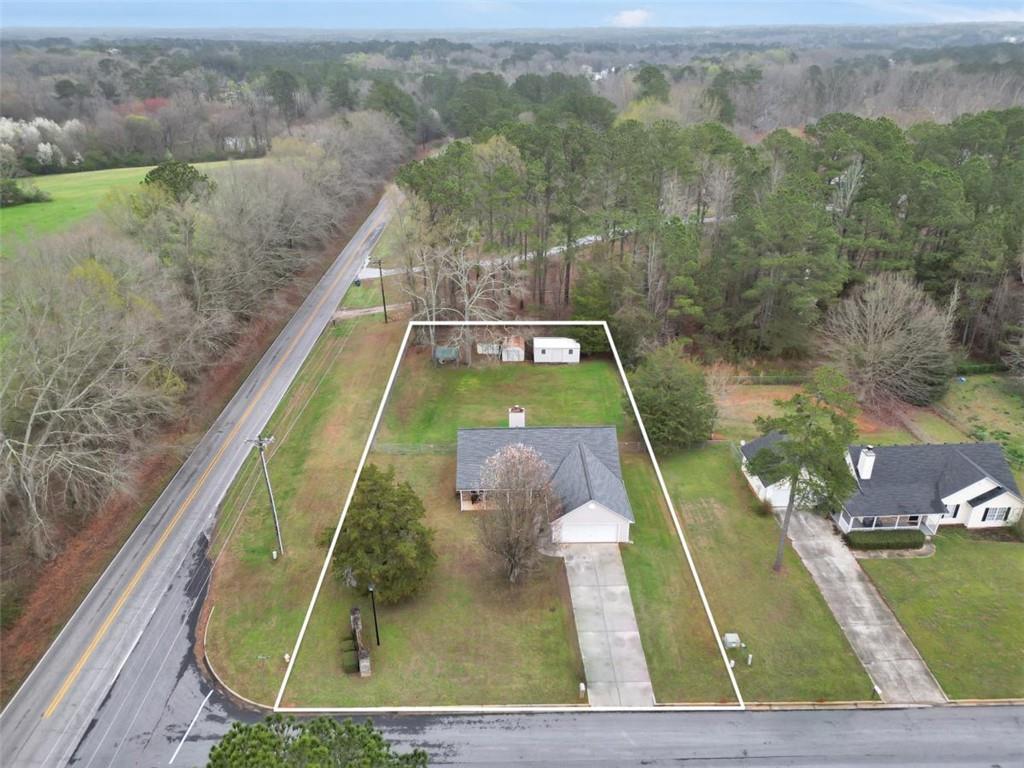 15 Tara Way Covington, GA 30016 - Photo 37 of 40 a view of swimming pool with a yard