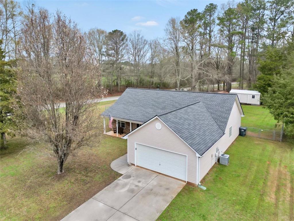 15 Tara Way Covington, GA 30016 - Photo 4 of 40 a view of a house with a yard