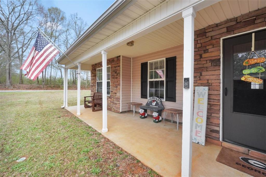 15 Tara Way Covington, GA 30016 - Photo 5 of 40 a view of a house with backyard and porch