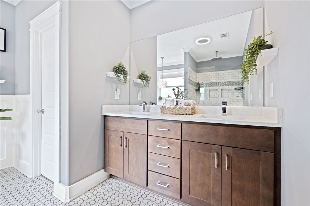 1050 Old Dacusville Road Easley, SC 29640 - Photo 18 of 33 This bathroom features a double vanity with ample storage and a contemporary design.
