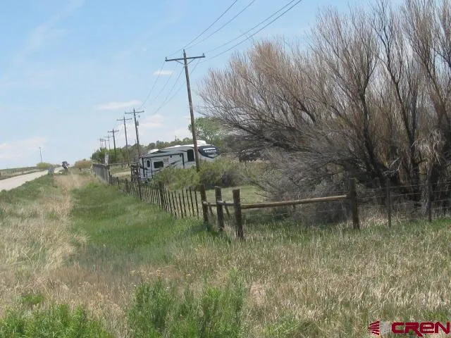 a view of a town with mountains in the background