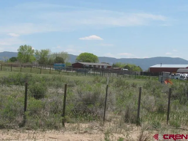 a view of a lake with a mountain in the background
