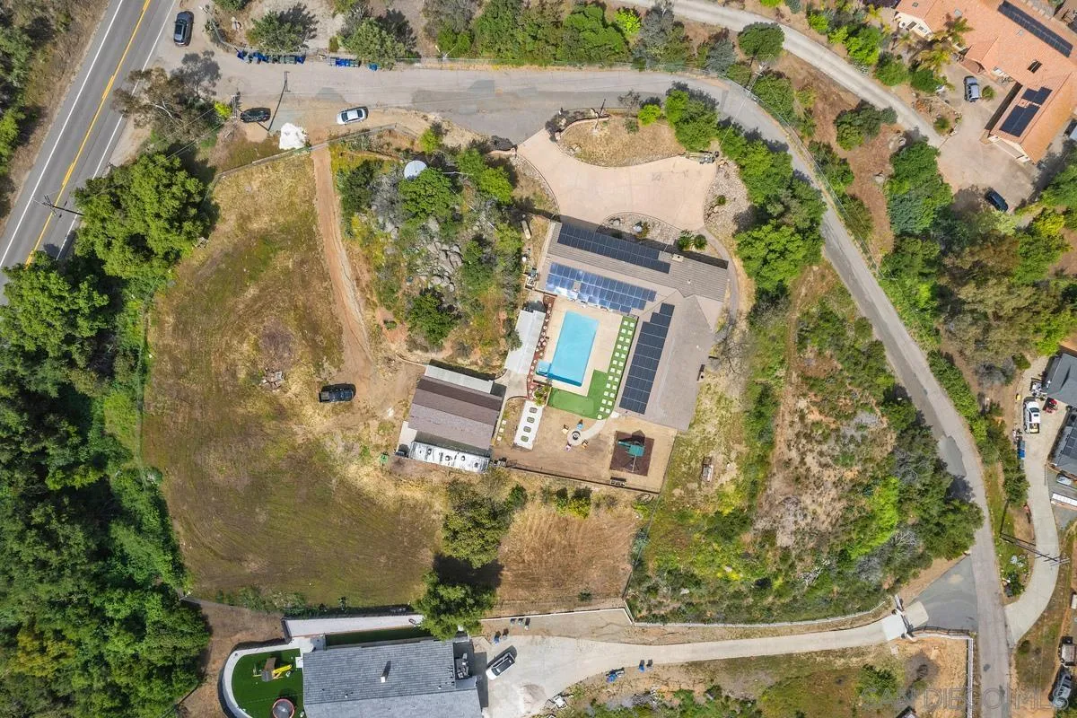 3245 Skytrail Ranch Road Jamul, CA 91935 - Photo 1 of 45 an aerial view of residential house with outdoor space and parking