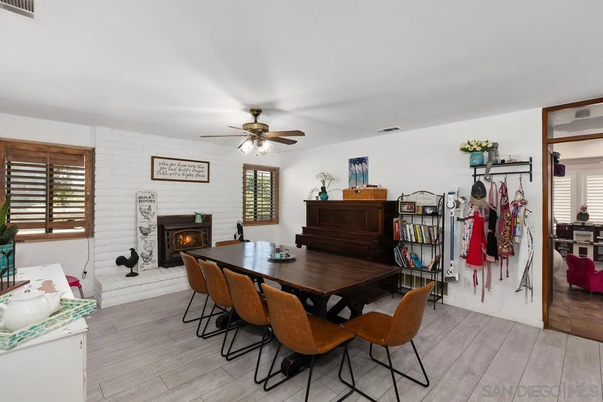 3245 Skytrail Ranch Road Jamul, CA 91935 - Photo 14 of 45 a dining room with furniture and window