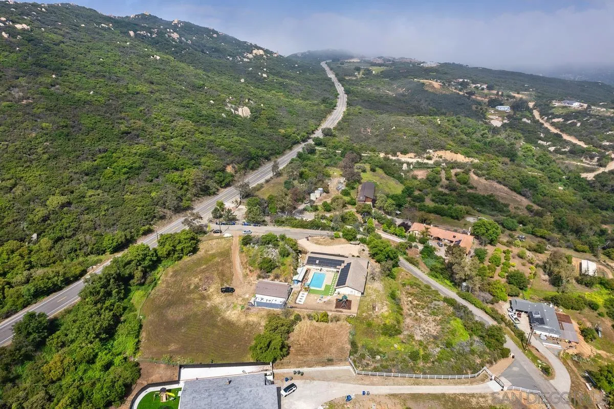 3245 Skytrail Ranch Road Jamul, CA 91935 - Photo 19 of 45 an aerial view of residential houses with outdoor space