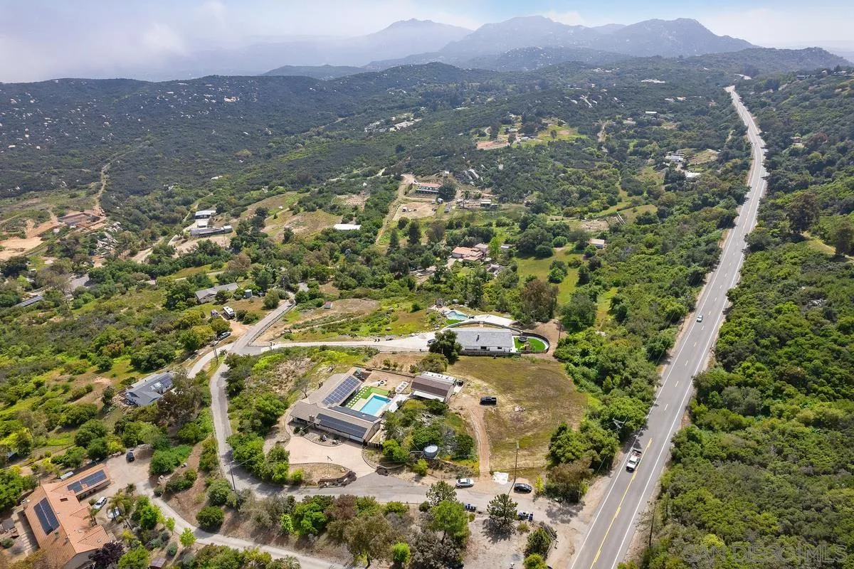 3245 Skytrail Ranch Road Jamul, CA 91935 - Photo 29 of 45 an aerial view of residential house with green space