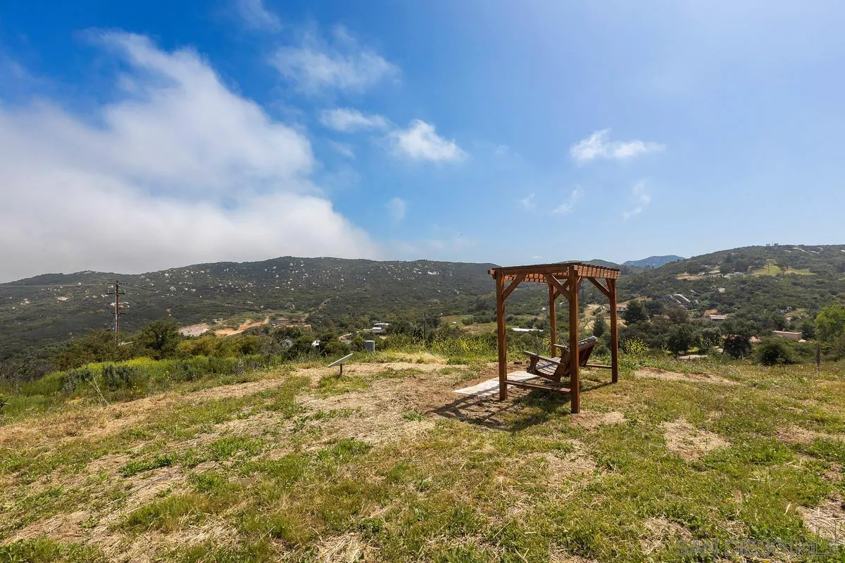 3245 Skytrail Ranch Road Jamul, CA 91935 - Photo 39 of 45 a view of a lake with a mountain in the background