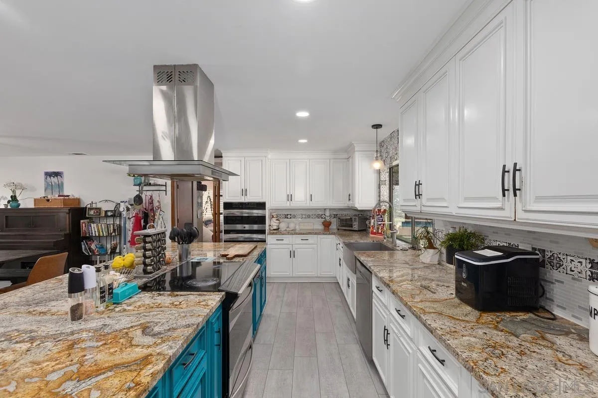 3245 Skytrail Ranch Road Jamul, CA 91935 - Photo 7 of 45 a kitchen with lots of counter top space