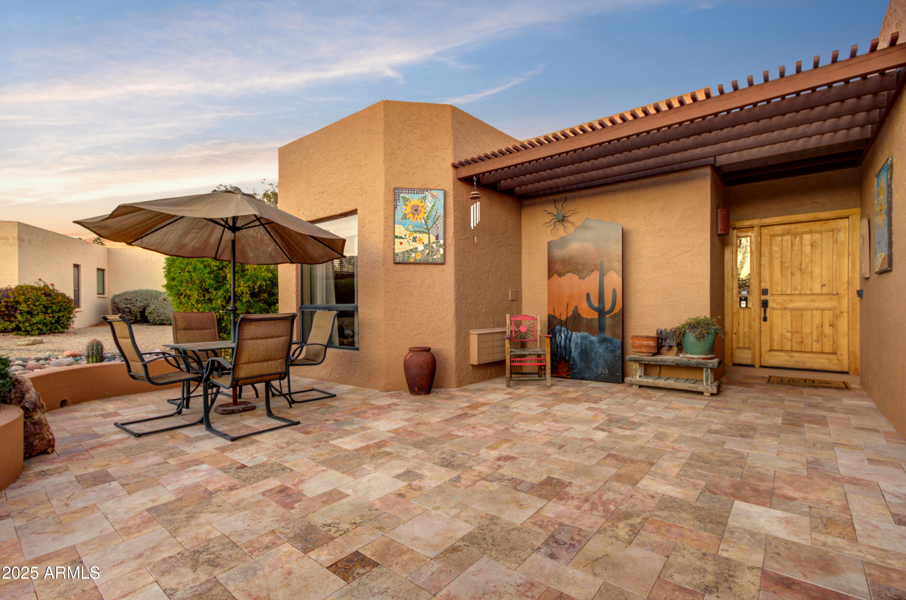 25828 North Primo Circle Rio Verde, AZ 85263 - Photo 1 of 21 a view of a lounge chairs in the patio with a small yard