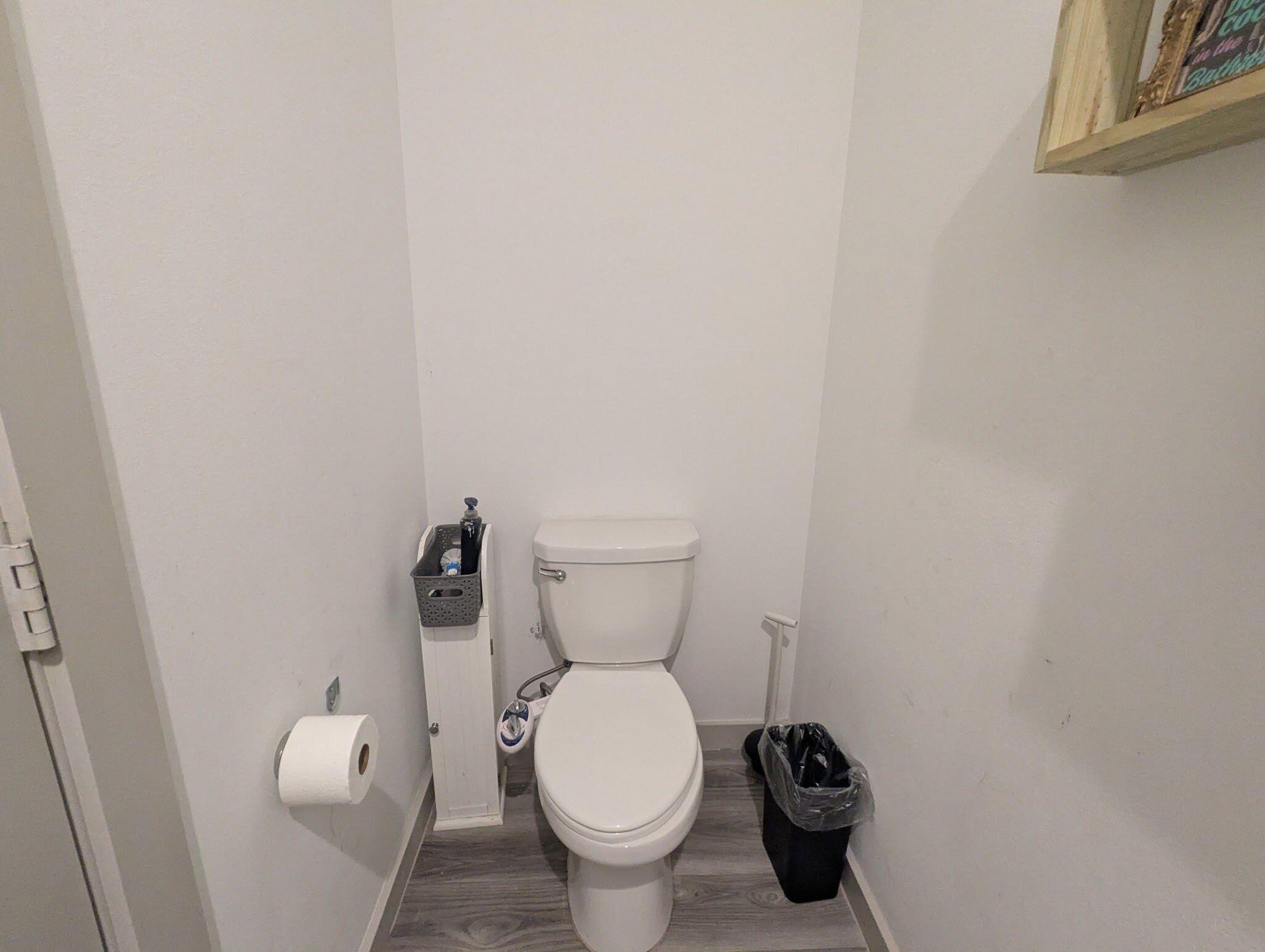 6802 55th Street Lubbock, TX 79407 - Photo 23 of 46 a white toilet sitting next to a white wall