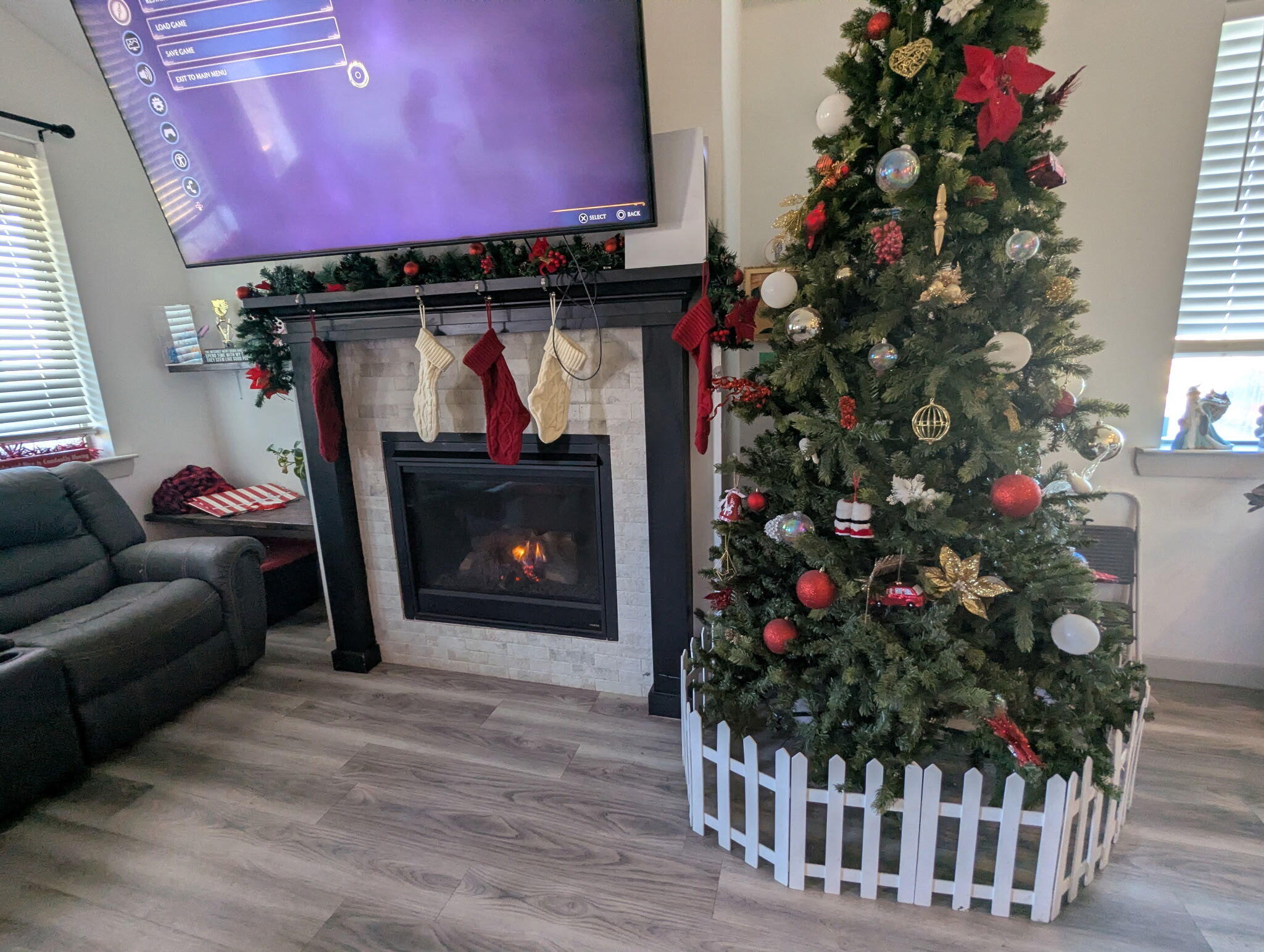 6802 55th Street Lubbock, TX 79407 - Photo 10 of 46 a living room with a fireplace a flower pot and a fireplace