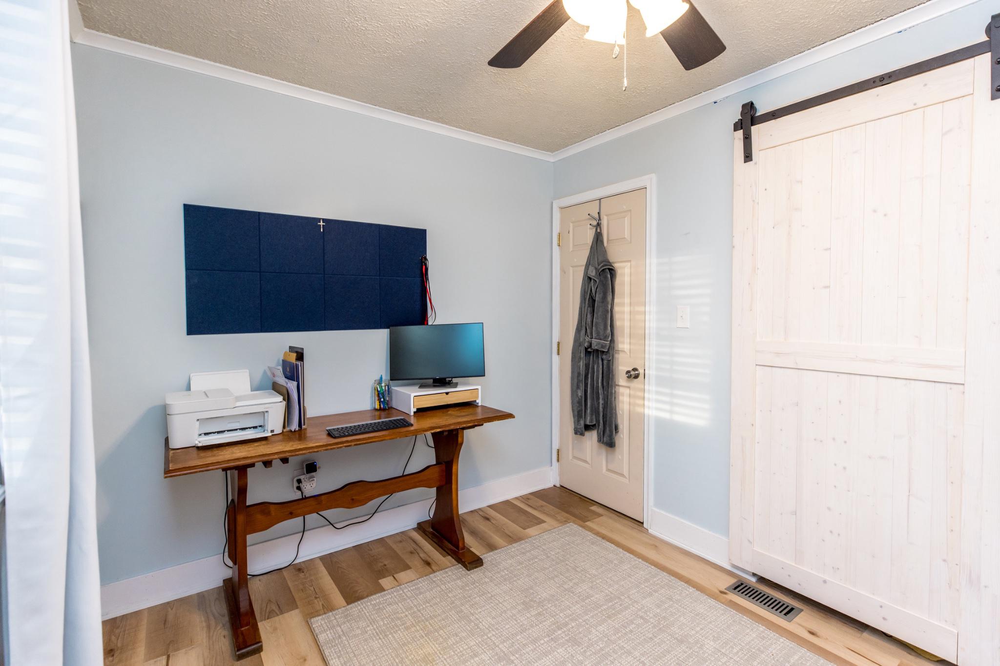 3427 York Street Manchester, MD 21102 - Photo 15 of 26 a workspace with furniture and window