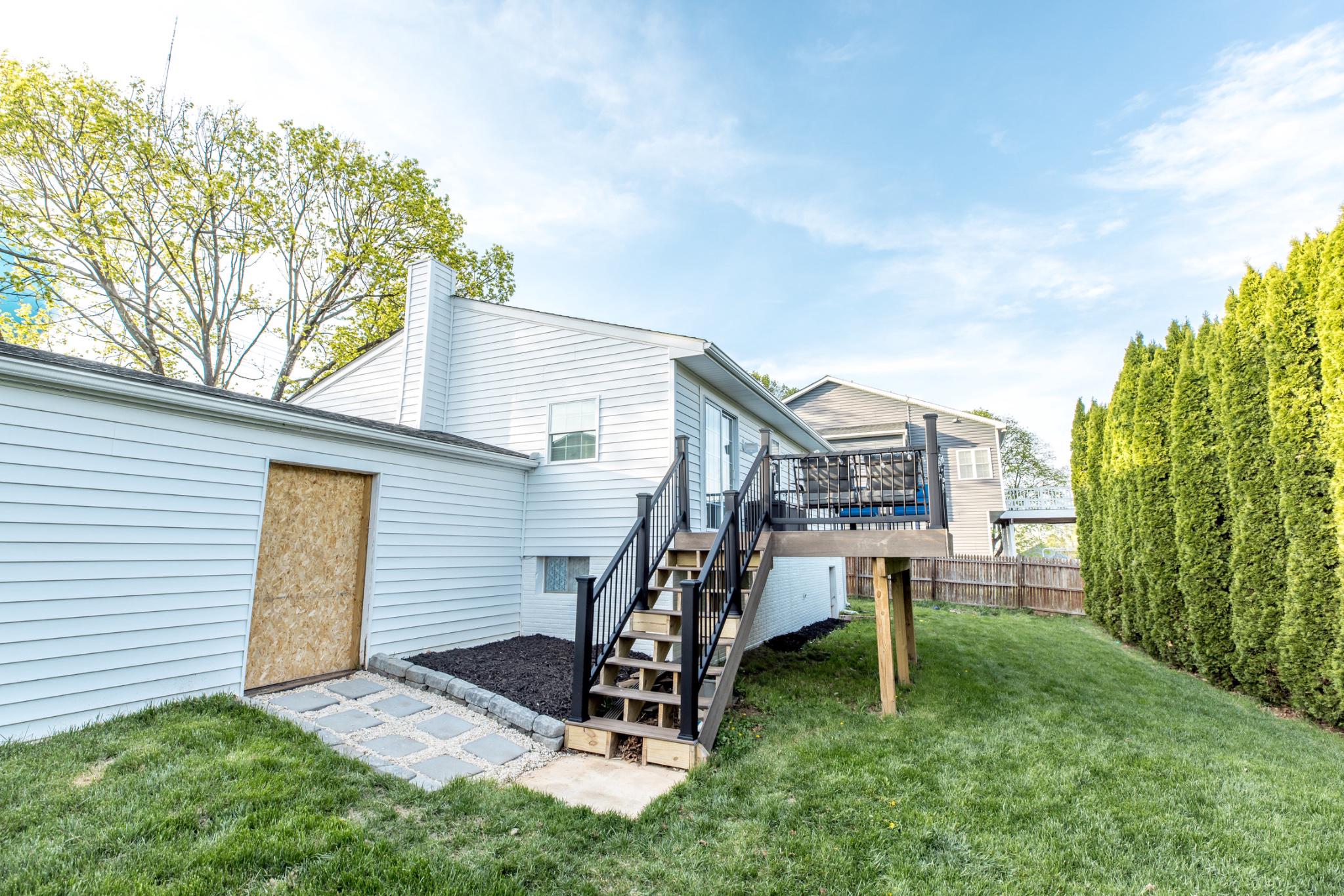 3427 York Street Manchester, MD 21102 - Photo 23 of 26 a view of a house with a backyard