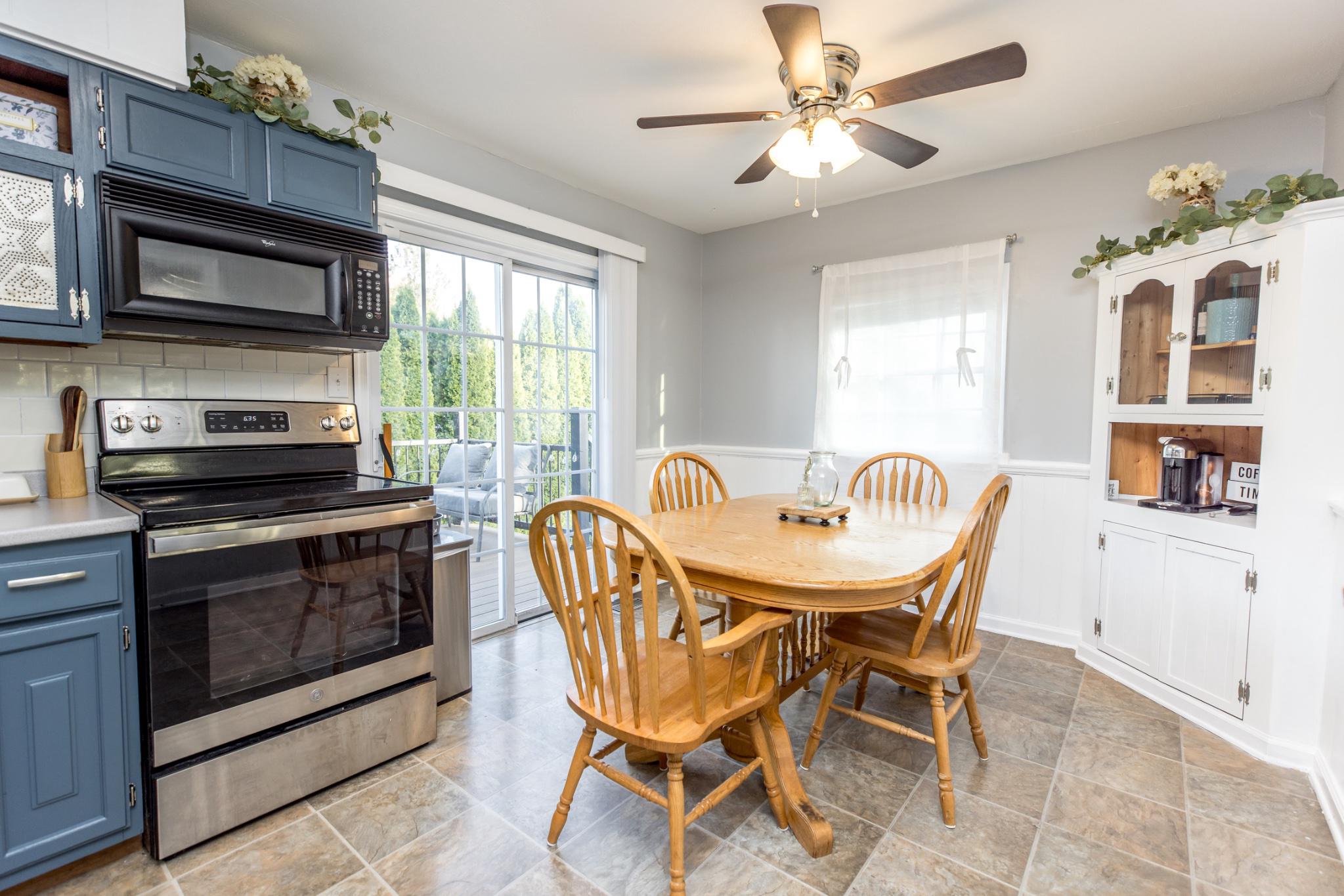 3427 York Street Manchester, MD 21102 - Photo 8 of 26 a view of a dining room with furniture window and outside view