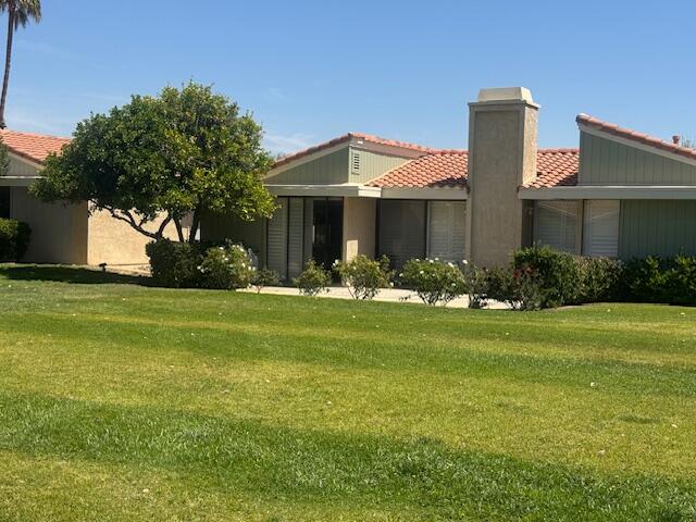 39725 Burton Drive Rancho Mirage, CA 92270 - Photo 20 of 22 rear lawn and patio