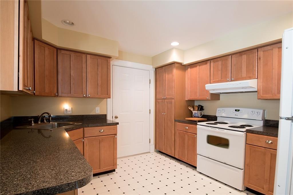 5 B Westvale Road, Unit B Kennebunkport, ME 04046 - Photo 6 of 29 Quality kitchen cabinets and dark...