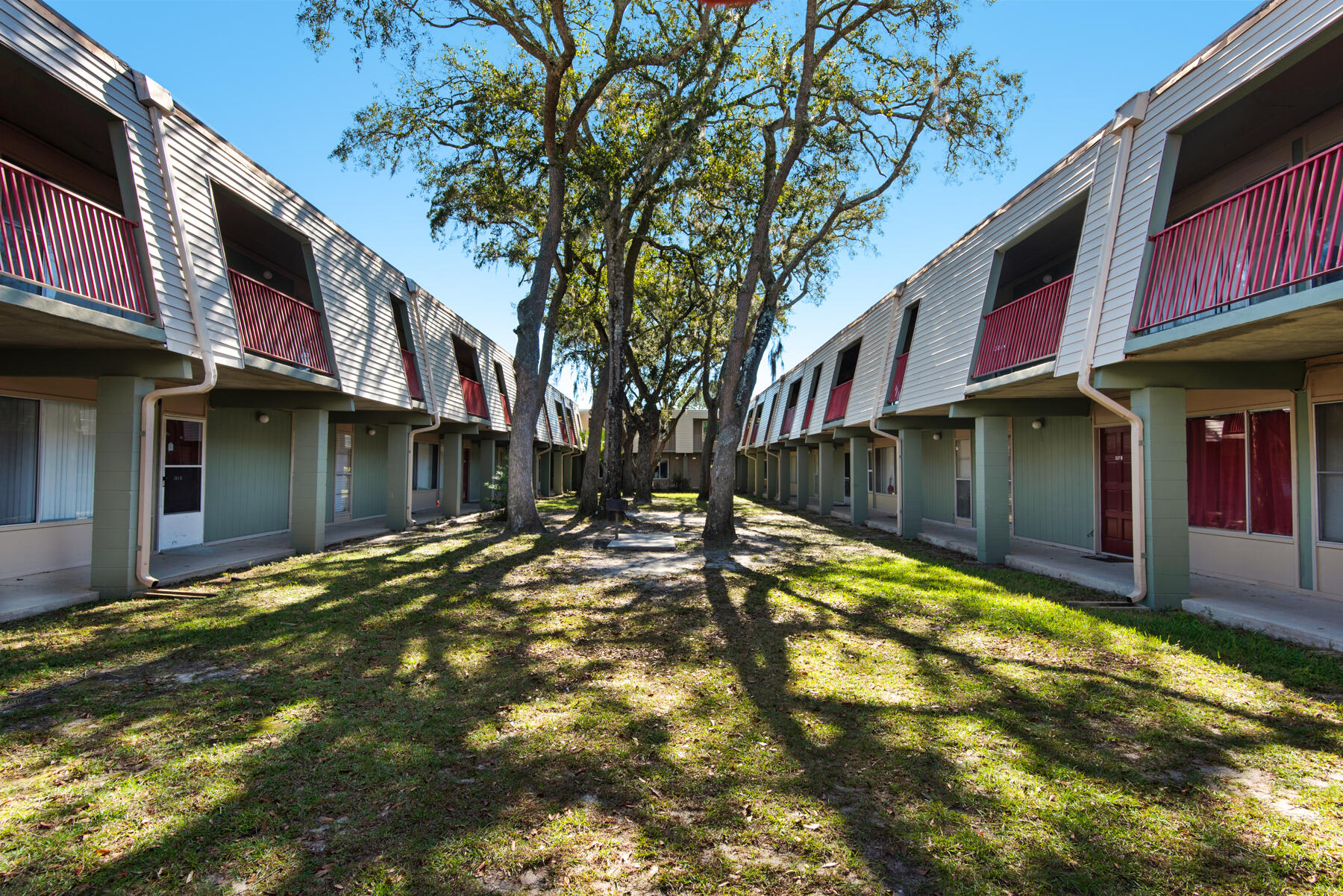 210 Pelham Road, Unit 215B Fort Walton Beach, FL 32547 - Photo 1 of 22 a view of a house with a yard