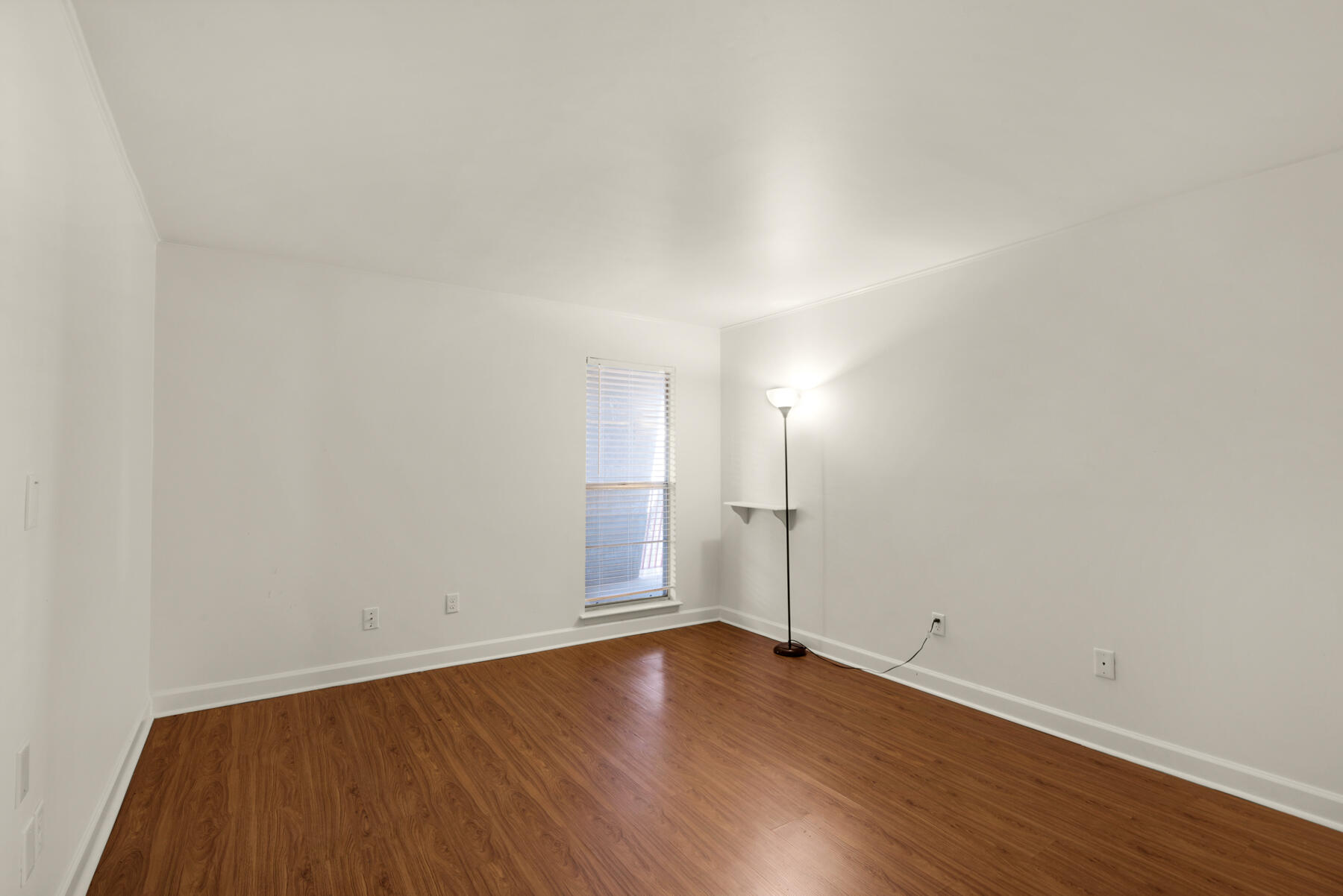 210 Pelham Road, Unit 215B Fort Walton Beach, FL 32547 - Photo 13 of 22 an empty room with wooden floor
