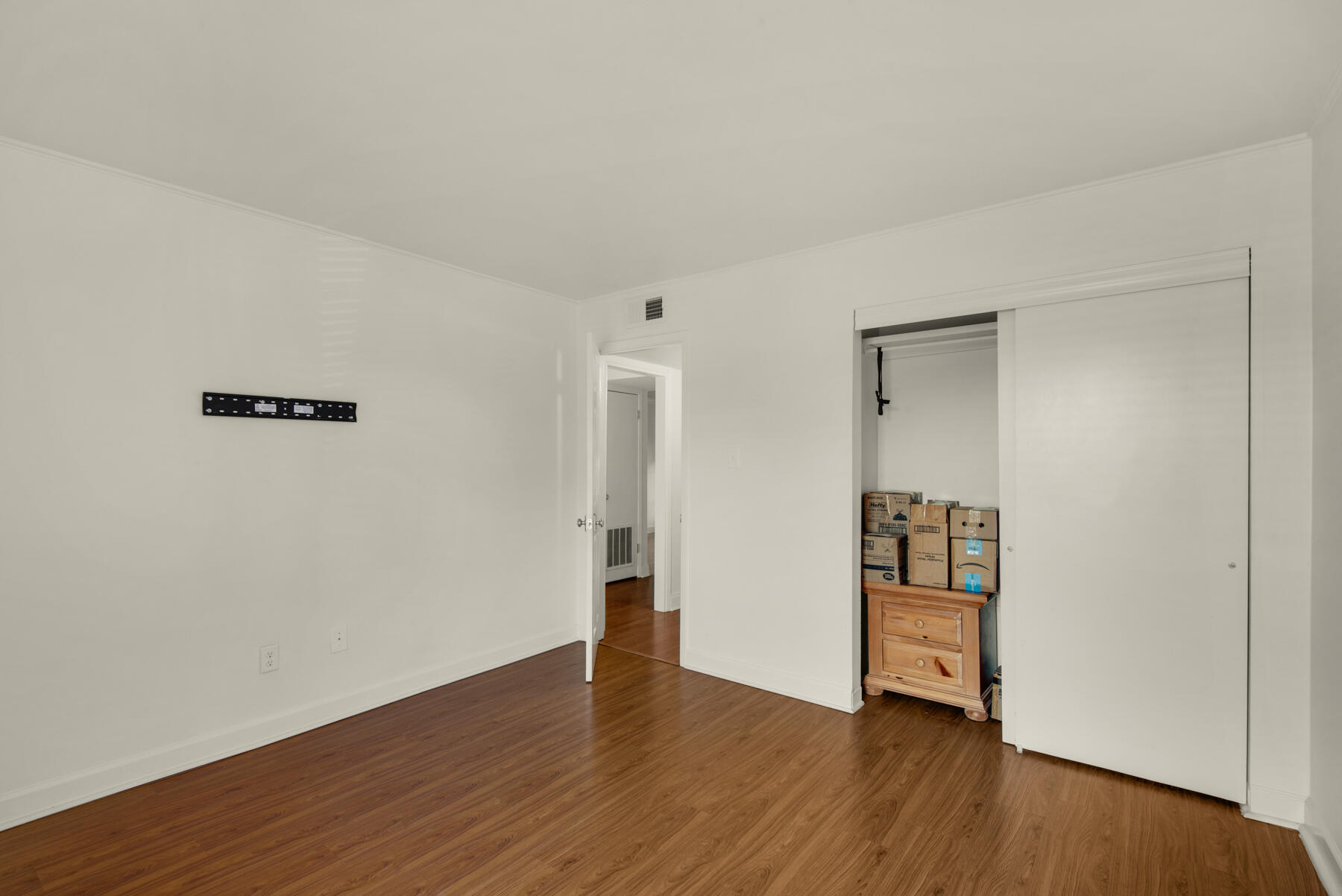 210 Pelham Road, Unit 215B Fort Walton Beach, FL 32547 - Photo 2 of 22 a view of a room with wooden floor