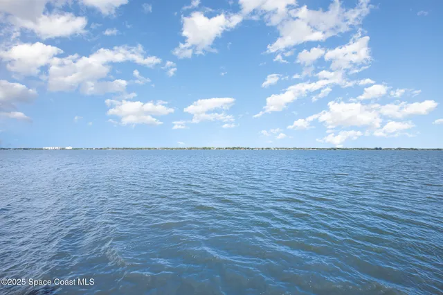 a view of swimming pool with a yard