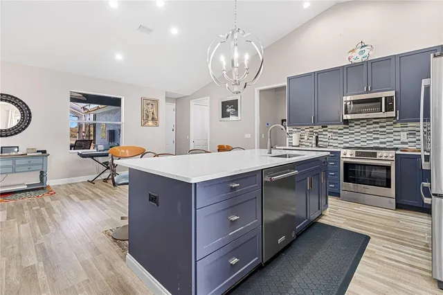 a bathroom with a toilet sink and shower curtain